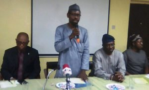 Dr. Abdulasalam the representative of the Lagos State Health Commissioner Dr. Jide Idris speaking at the opening ceremony of HEWAN's 7th Symposium flanked L-R by LUTH CMD, Prof. Chris Bde, LASUTH CMD, Prof. Wale Oke and Dr. Lawal Bakare of the Nigerian Centre for Disease Control (NCDC).